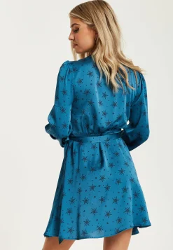 Women's Mini Dress in Petrol Blue with Long Sleeves, Black Star and Polka Dot Print Wrap Style by Liquorish