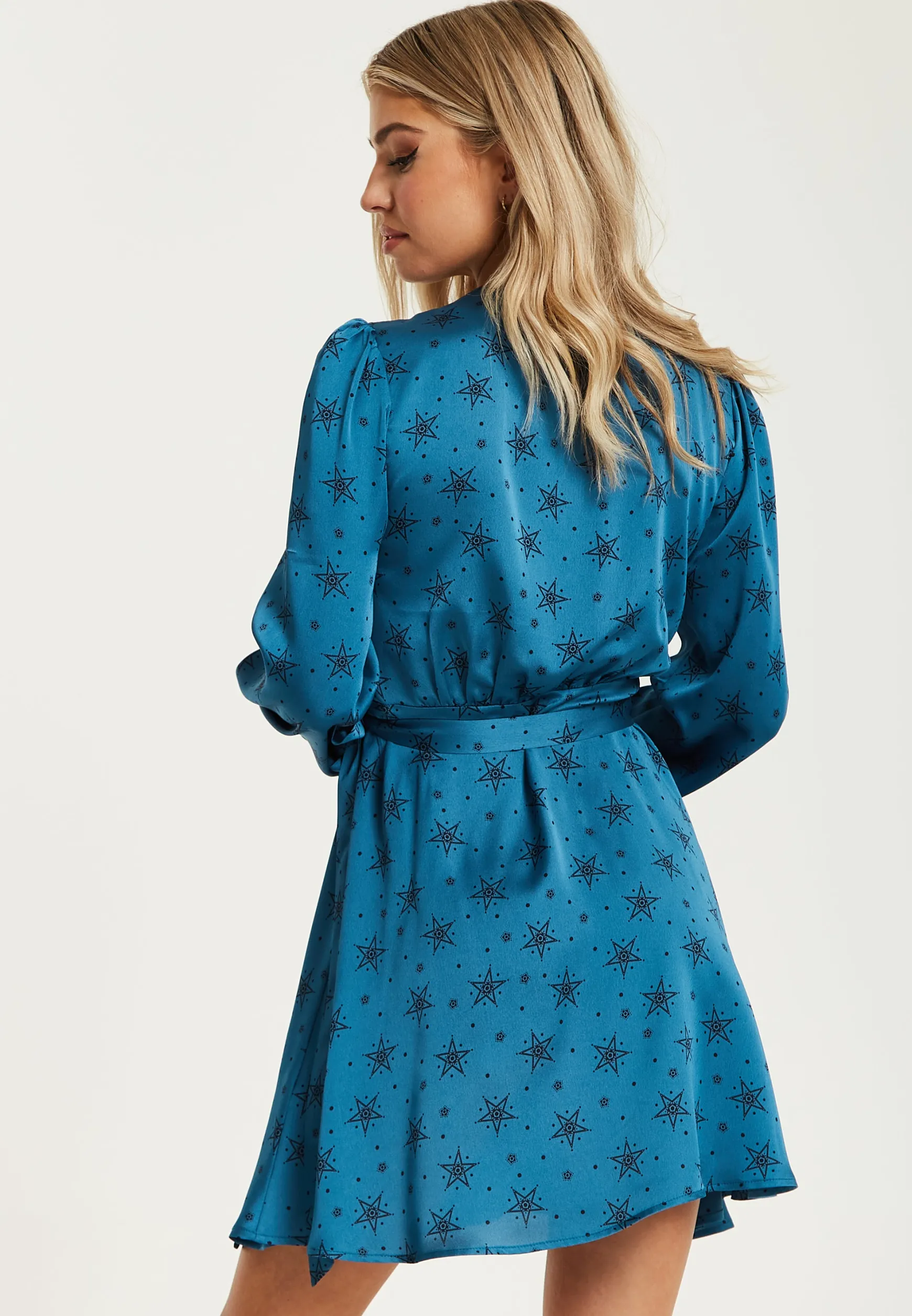 Women's Mini Dress in Petrol Blue with Long Sleeves, Black Star and Polka Dot Print Wrap Style by Liquorish