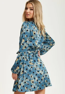 Women's Mini Dress in Petrol Blue with Long Sleeves, Floral and Polka Dot Print Wrap Style by Liquorish
