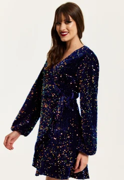Women's Mini Dress in Royal Blue Velvet with Long Sleeves & Multicolour Sequin Wrap Style - Liquorish