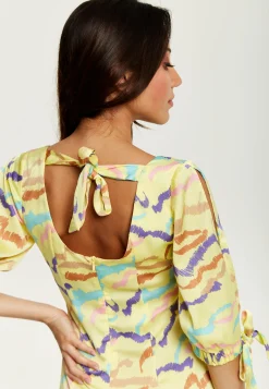 Women's Mini Dress in Yellow with Sleeve Tie-Ups and Back Tie-Up Detail - Abstract Zebra Print by Liquorish