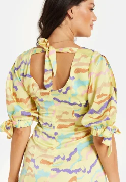 Women's Mini Dress in Yellow with Sleeve Tie-Ups and Back Tie-Up Detail - Abstract Zebra Print by Liquorish