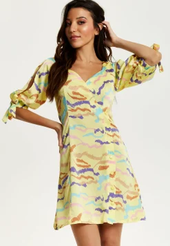Women's Mini Dress in Yellow with Sleeve Tie-Ups and Back Tie-Up Detail - Abstract Zebra Print by Liquorish