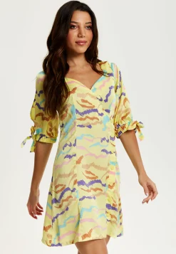 Women's Mini Dress in Yellow with Sleeve Tie-Ups and Back Tie-Up Detail - Abstract Zebra Print by Liquorish