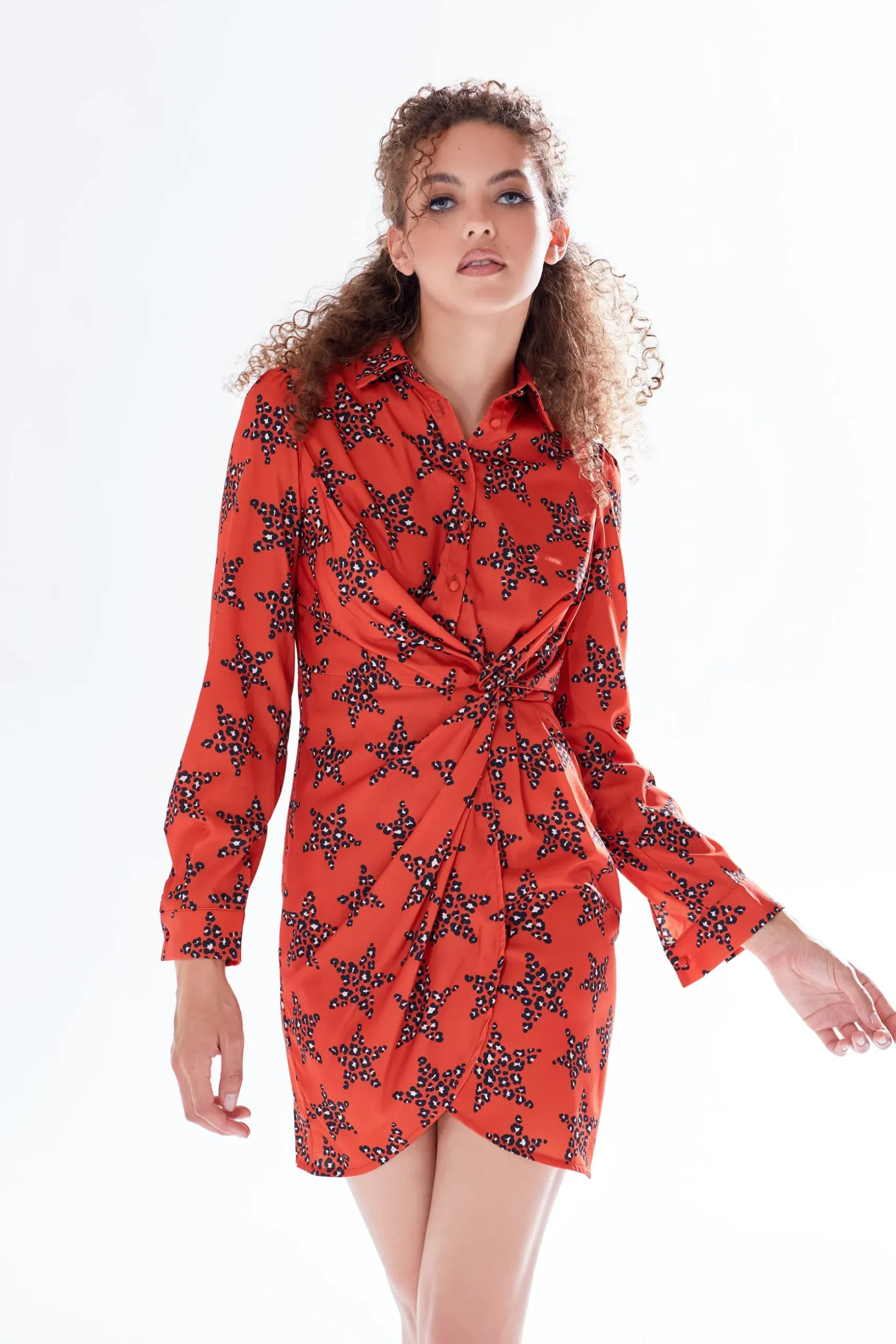 Women's Mini Dress with Collar, Long Sleeves, Twisted Front, and Vibrant Orange Star Print - Liquorish