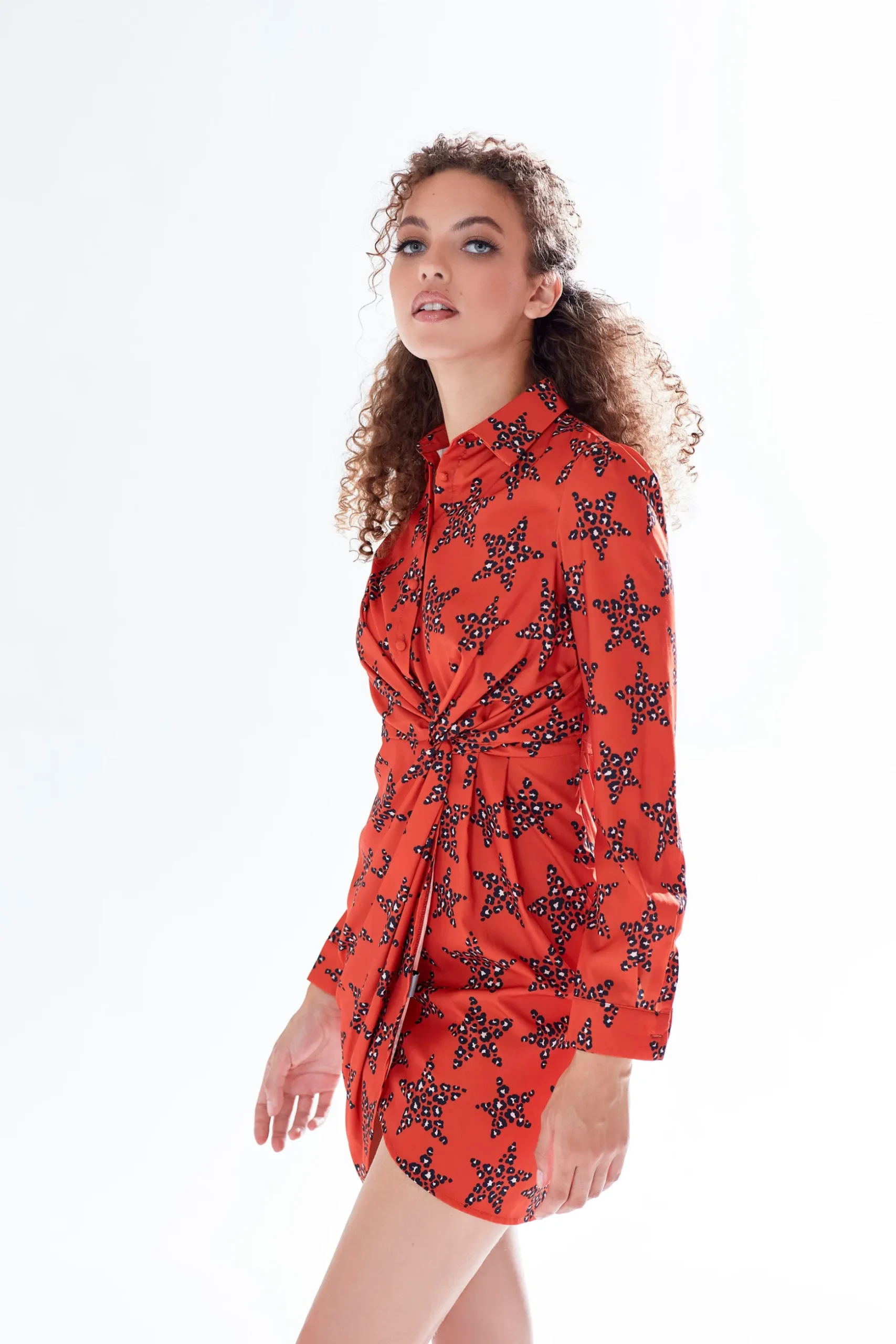 Women's Mini Dress with Collar, Long Sleeves, Twisted Front, and Vibrant Orange Star Print - Liquorish
