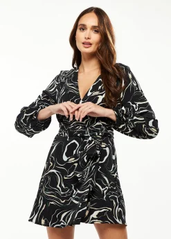 Women's Mini Dress with Long Sleeves in Black - Flattering Wrap Style and Playful Scribble Print by Liquorish