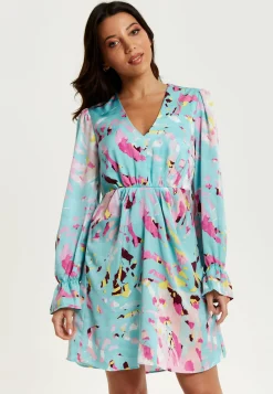 Women's Mini Dress with Long Sleeves, Blue Abstract Print, Open Back Design, Chic & Flattering - Liquorish