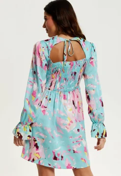 Women's Mini Dress with Long Sleeves, Blue Abstract Print, Open Back Design, Chic & Flattering - Liquorish