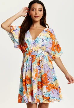 Women's Mini Dress with Open Back and Elasticated Waist in Multicolour Floral Print - Liquorish