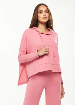 Women's Oversized Hooded Sweatshirt with Front Pocket in Pink - Stylish, Comfortable, with Side Slits and Adjustable Hood