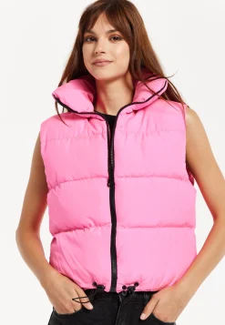 Women's Pink Puffer Vest with Drawstring Hem and High Collar for Cozy Layering