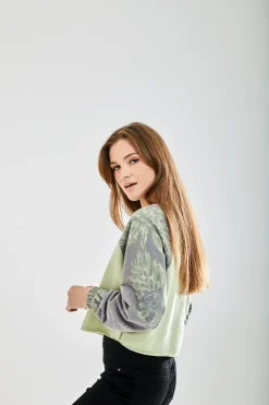 Women's Printed Raglan Sleeve Crop Sweat - Long sleeves, elasticated cuffs, regular fit, available in UK sizes 8-12.