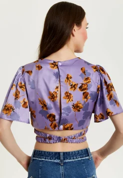 Women's Purple Floral Crop Top With Tie Detail and Short Sleeves