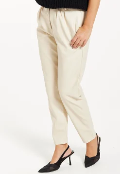 Women's Trousers in Cream with Pleated Waist, Tapered Fit, Faux Leather Detail - Liquorish
