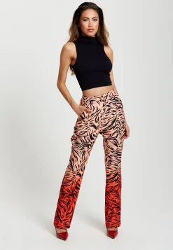 Women's Trousers in Orange and Nude Zebra Print with Slit Detail and Button Closure by Liquorish
