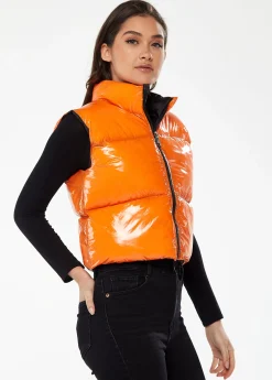 Women's Wet Look Gilet in Orange - Sleeveless, High Neck, Zip Closure, Cropped Fit, Regular Fit, Available in Classic and Bright Colours.