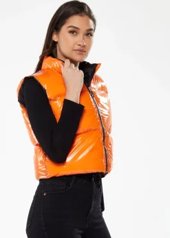 Women's Wet Look Gilet in Orange - Sleeveless, High Neck, Zip Closure, Cropped Fit, Regular Fit, Available in Classic and Bright Colours.