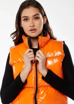 Women's Wet Look Gilet in Orange - Sleeveless, High Neck, Zip Closure, Cropped Fit, Regular Fit, Available in Classic and Bright Colours.